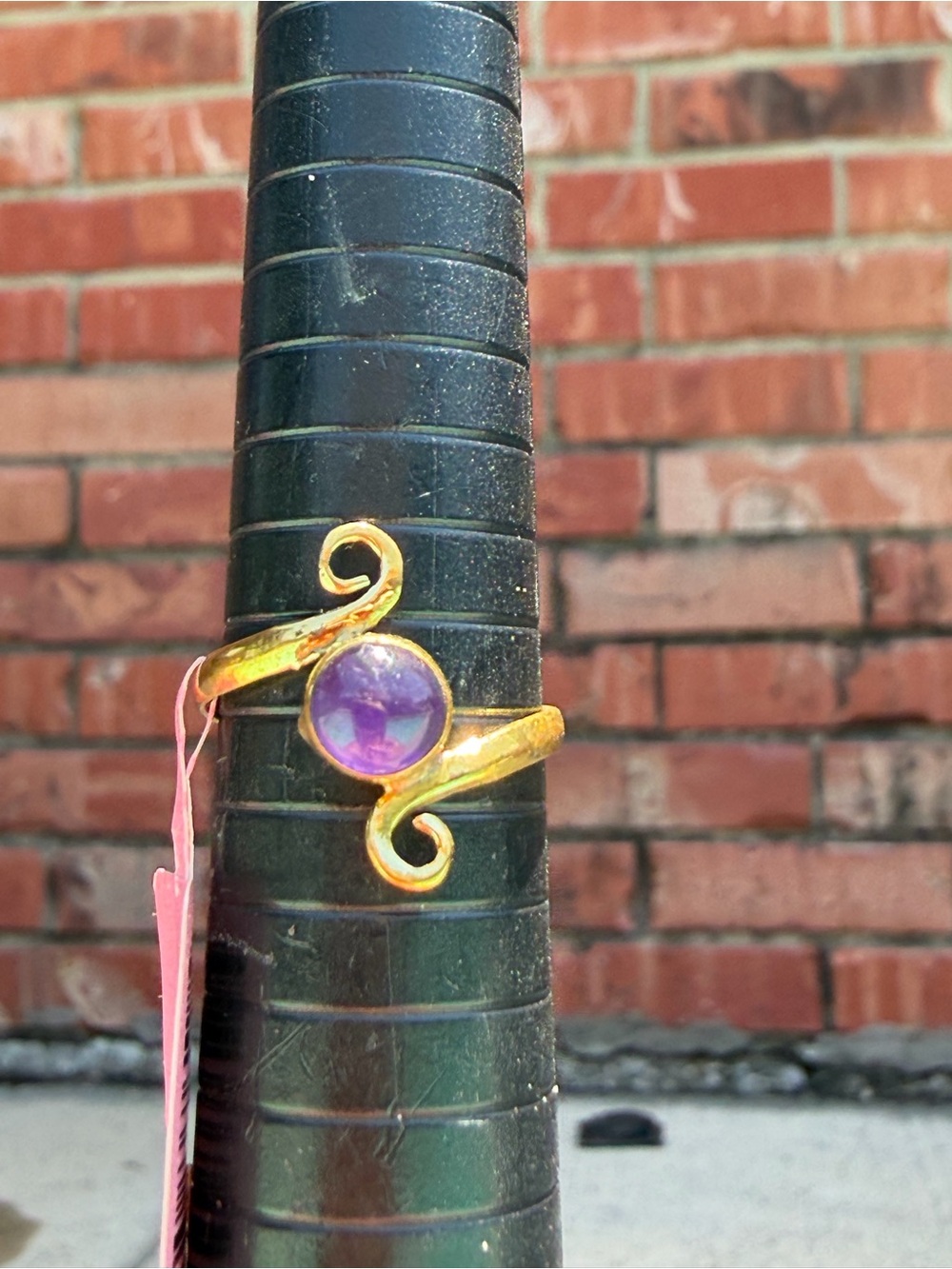 Gold-Tone Swirl Ring with Purple Gemstone C